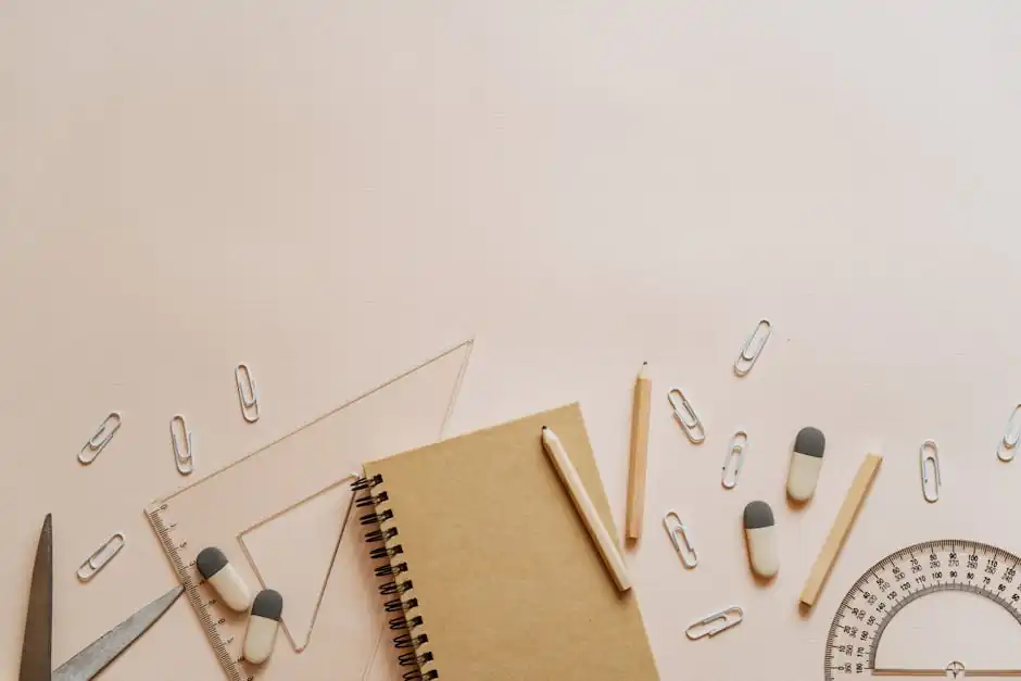 Spiral Notebook Pencils and Paper Clips Flatlay